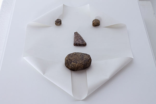 Untitled (rocks and paper) by Michael Dumontier